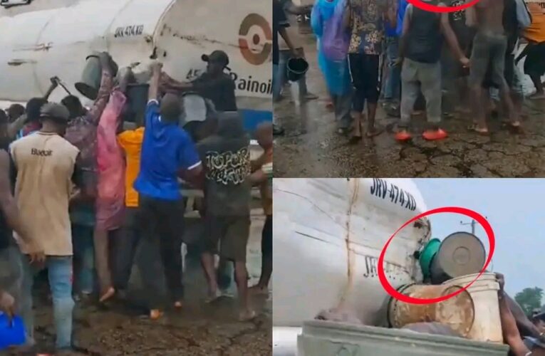 🚨 DANG£R: Residents Rush to Scoop Fuel From Leaking Tanker in Delta State