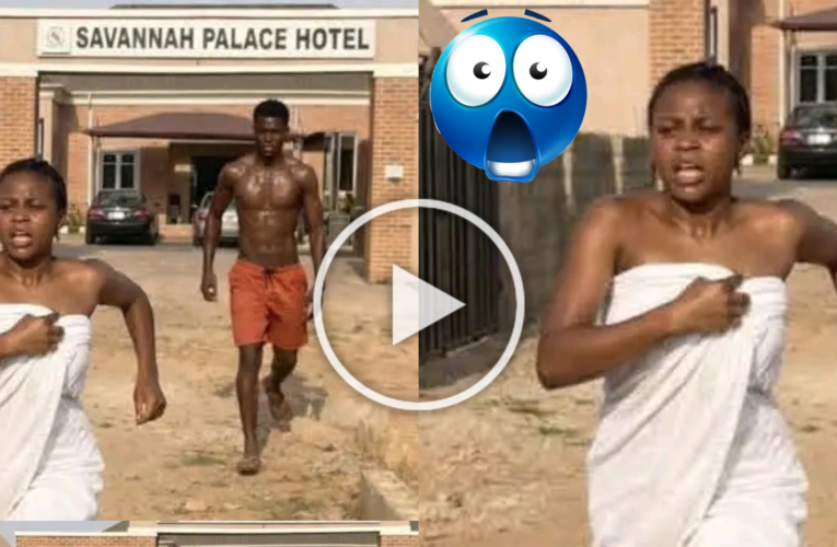 WOMAN RUNS OUT OF H0TEL WRAPPED IN TOWEL!